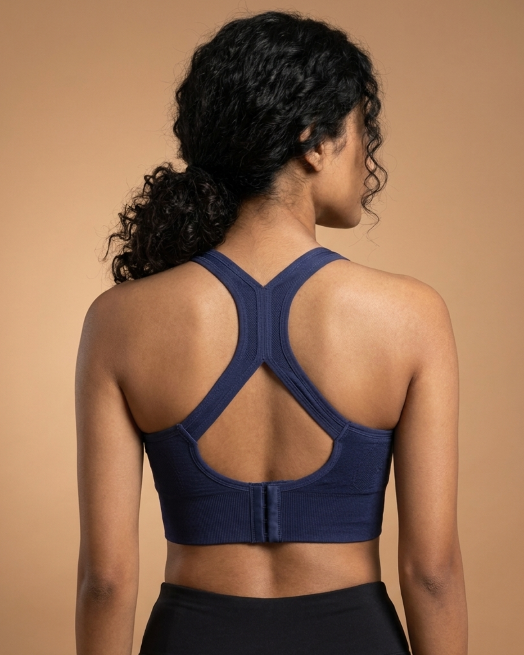 Easy Fit Sports Bra in Navy Blue, back view showing racerback straps and hook closure, SHAPE Lingerie