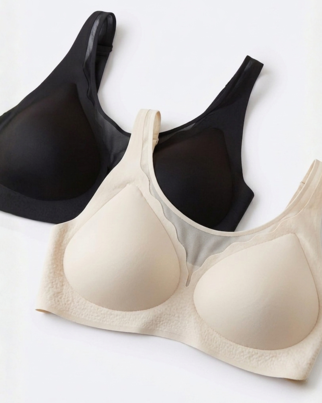 GlowCut Seamless Bra in Midnight Black and Beige, flat lay, SHAPE