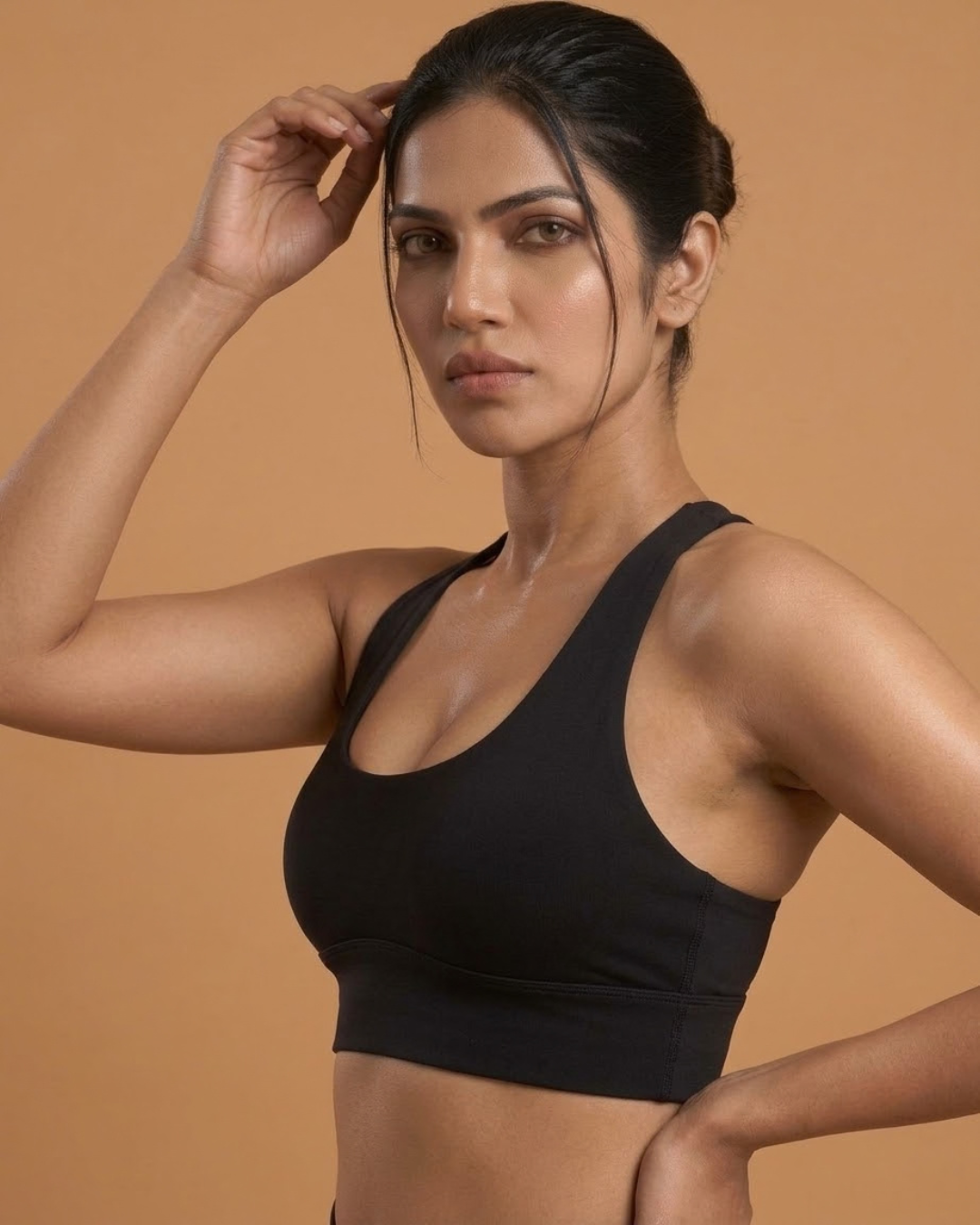 Power Sculpt Sports Bra in Black, worn by a model, SHAPE Lingerie