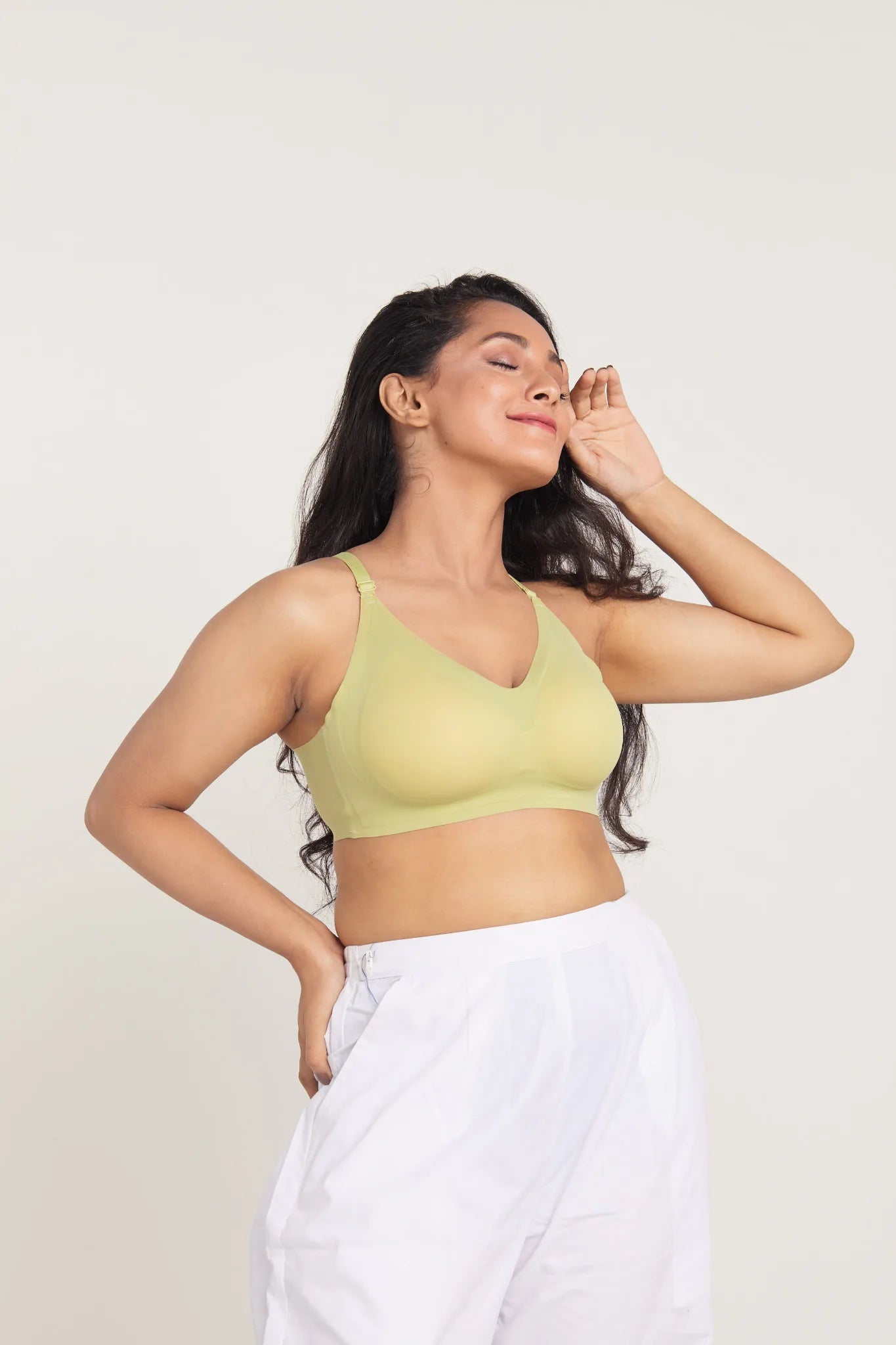 Lime green SHAPE Seamless Lite Bra, side view, on model