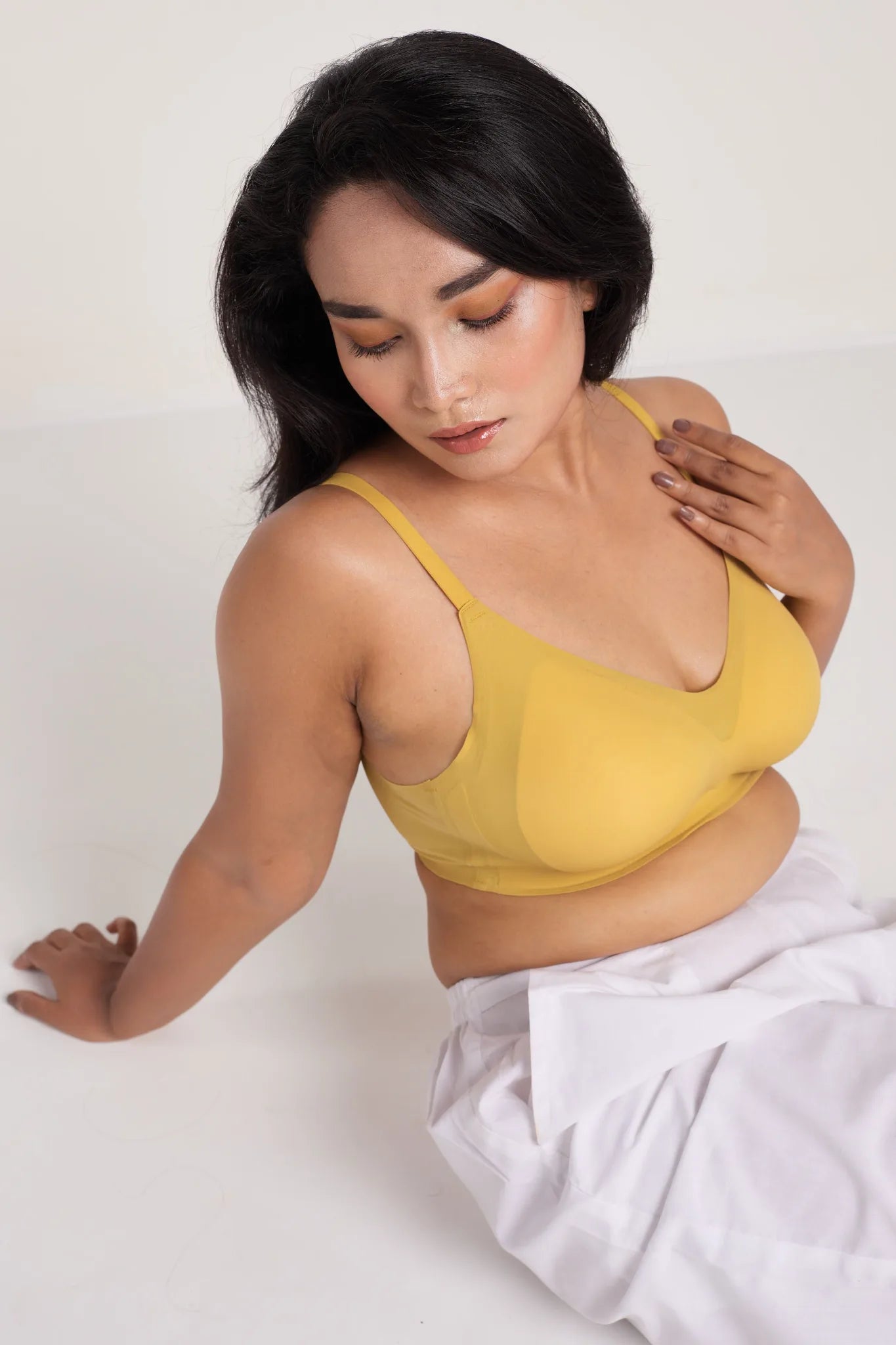 Model wearing yellow SHAPE Seamless Lite Bra